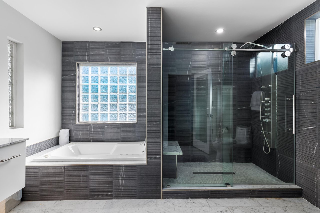 Enjoy a jetted jacuzzi and gorgeous shower