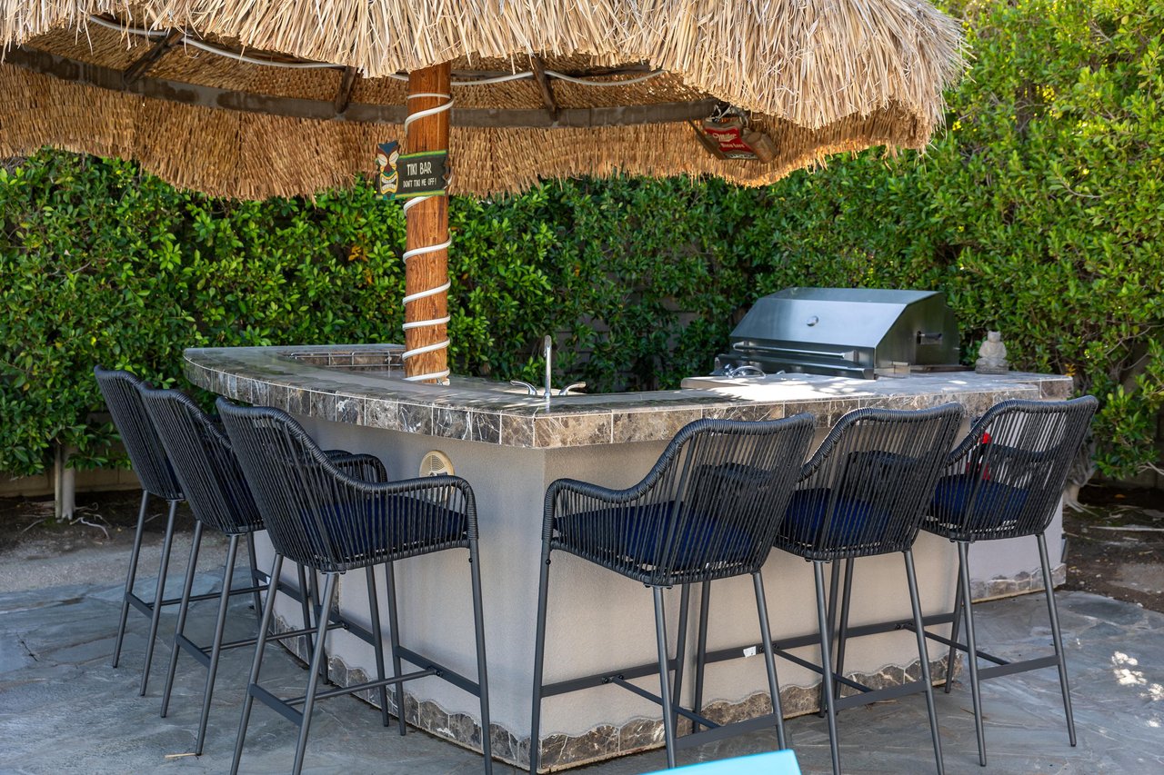 Outdoor palapa kitchen with BBQ