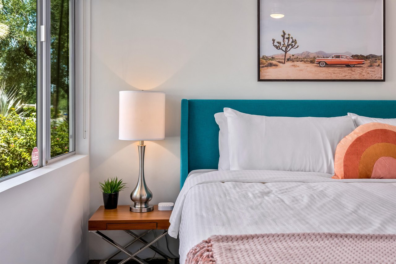 Nightstand with plant and lamp