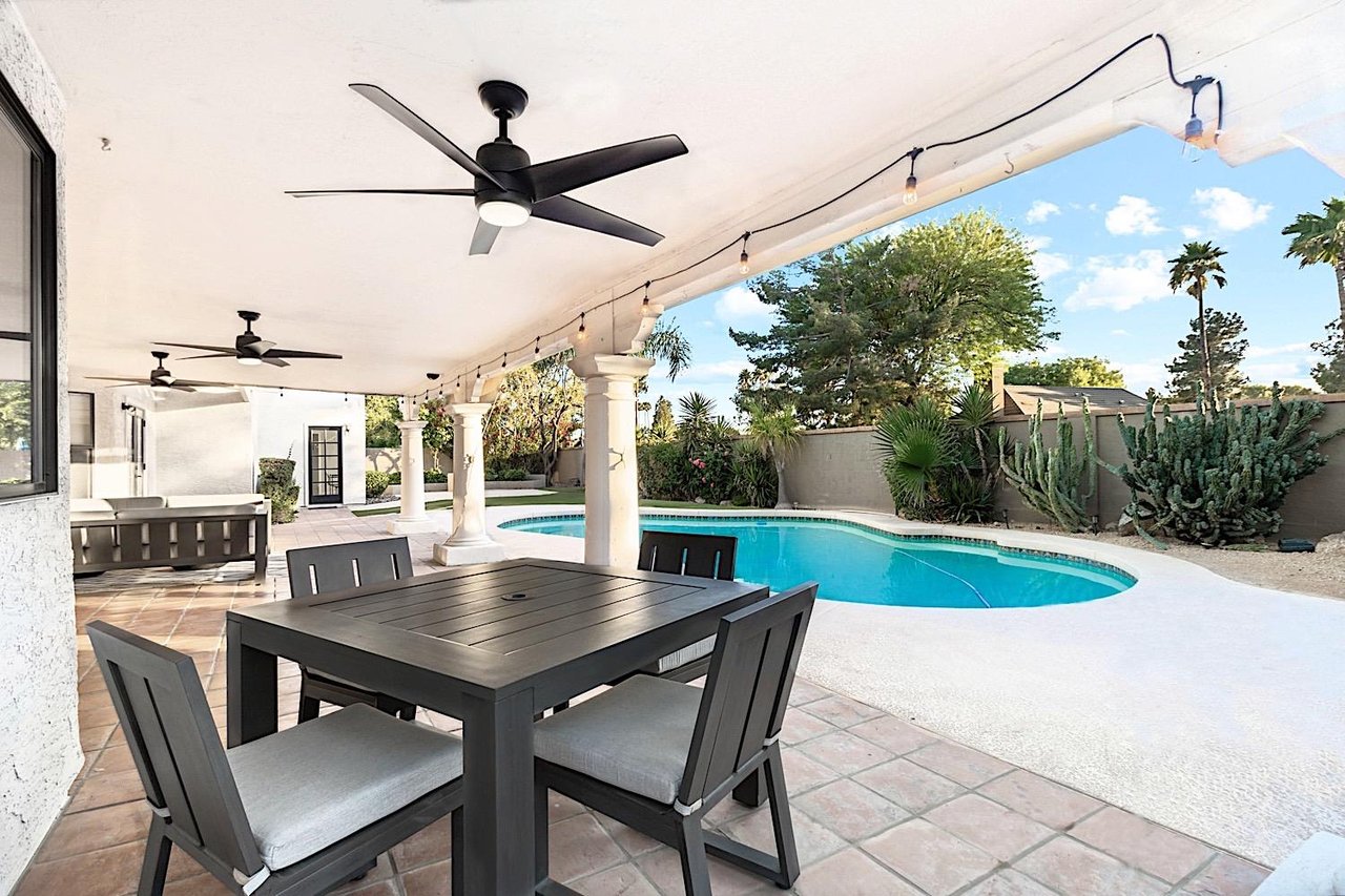 Outdoor dining table and entertaining space w BBQ Grill