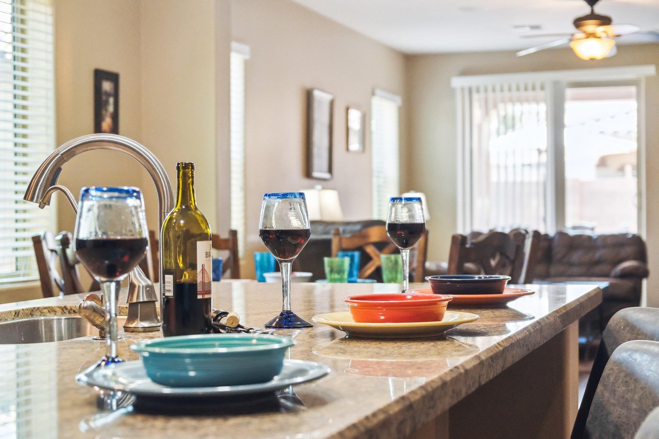 Enjoy a glass of wine and appetizers while watching over the cook