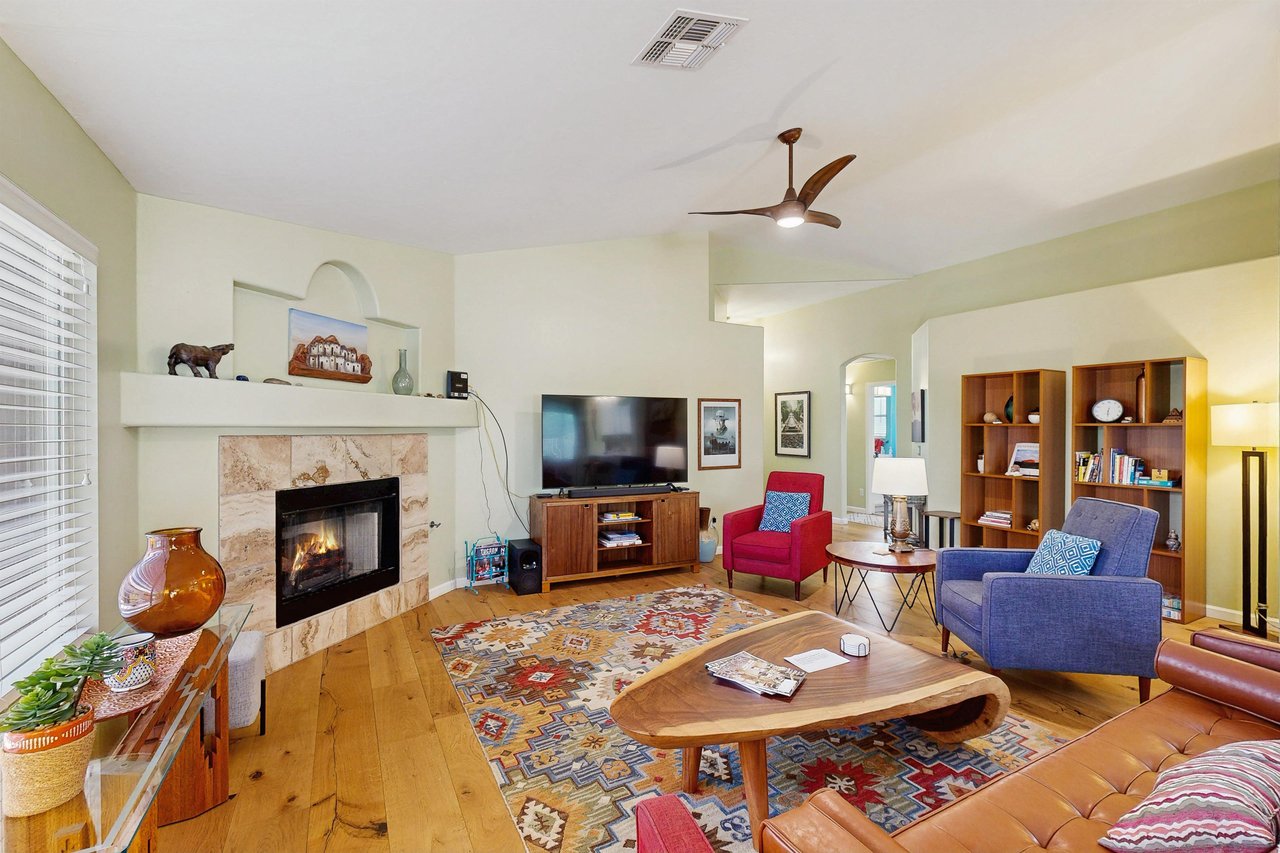 Features vaulted ceilings, plenty of seating, fireplace, and smart TV.