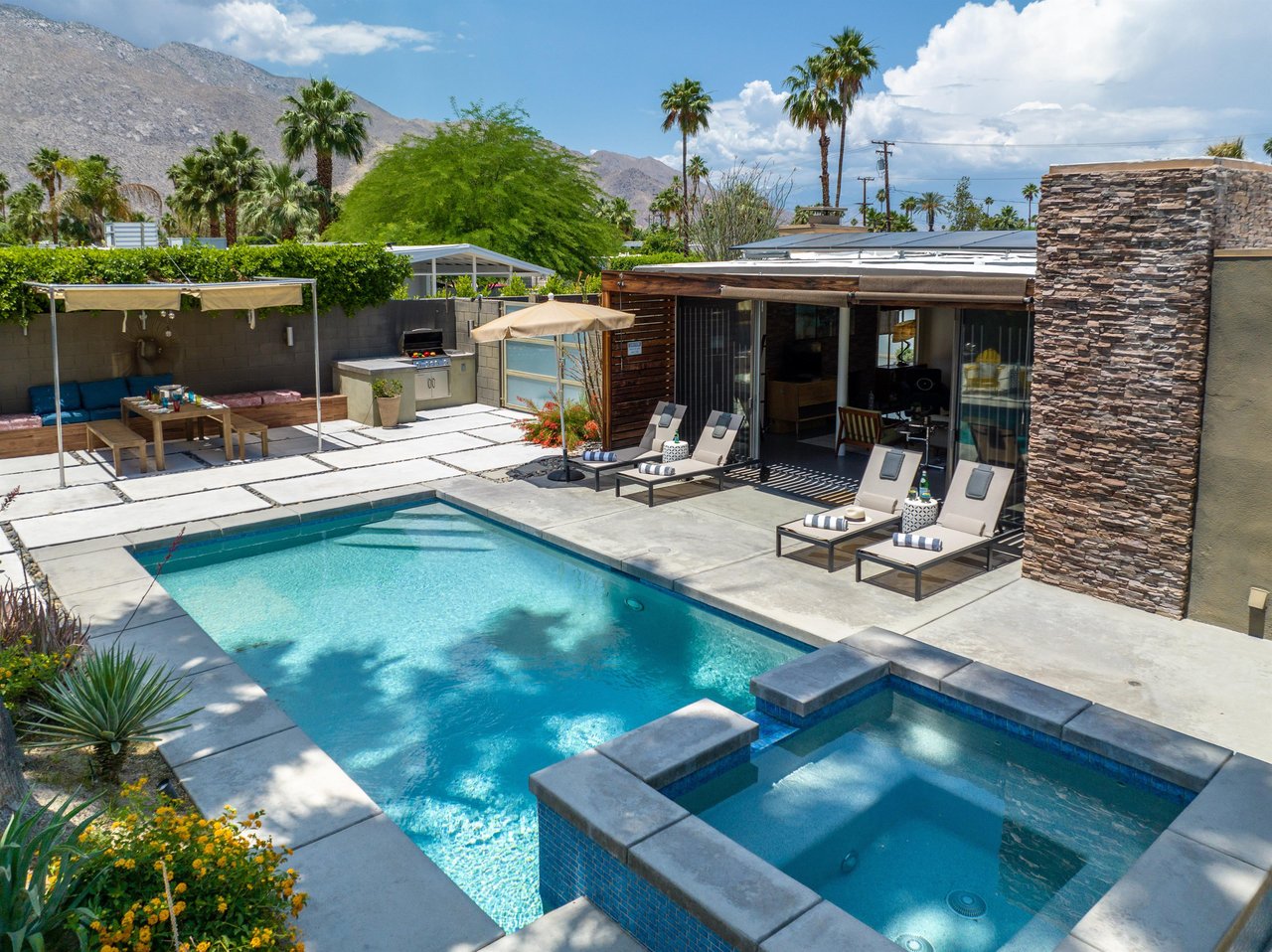 Aerial views of the pool and loungers