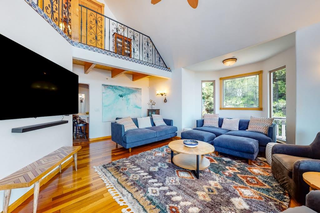 Featuring AMAZING views, plenty of seating, vaulted ceilings, Wood Burning stove, and a Smart TV