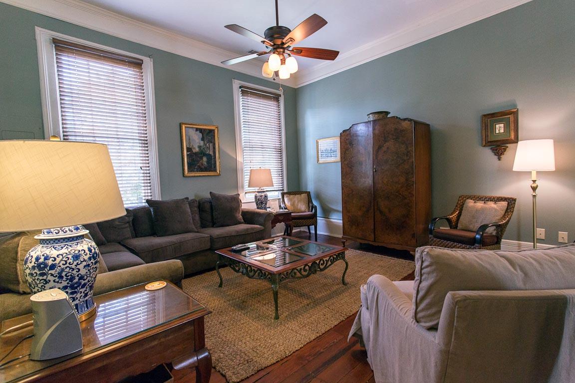 A TV is hidden in the antique hutch.