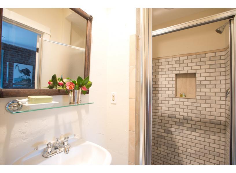 En suite upstairs with walk in shower.