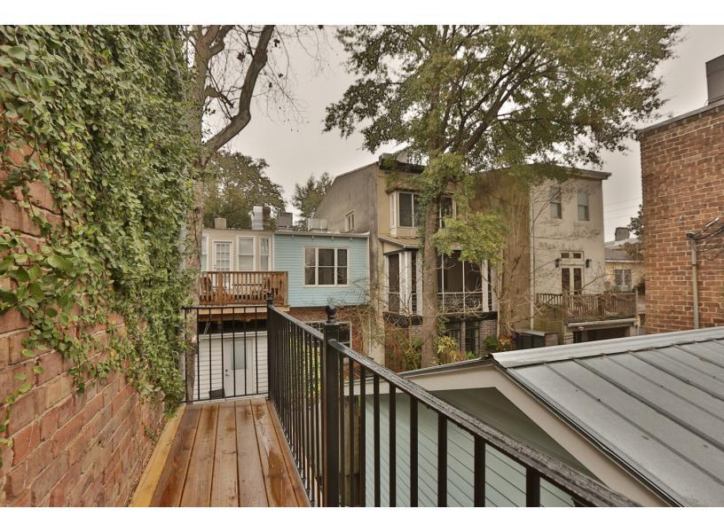 Small balcony off the bedroom overlooking the neighborhood.