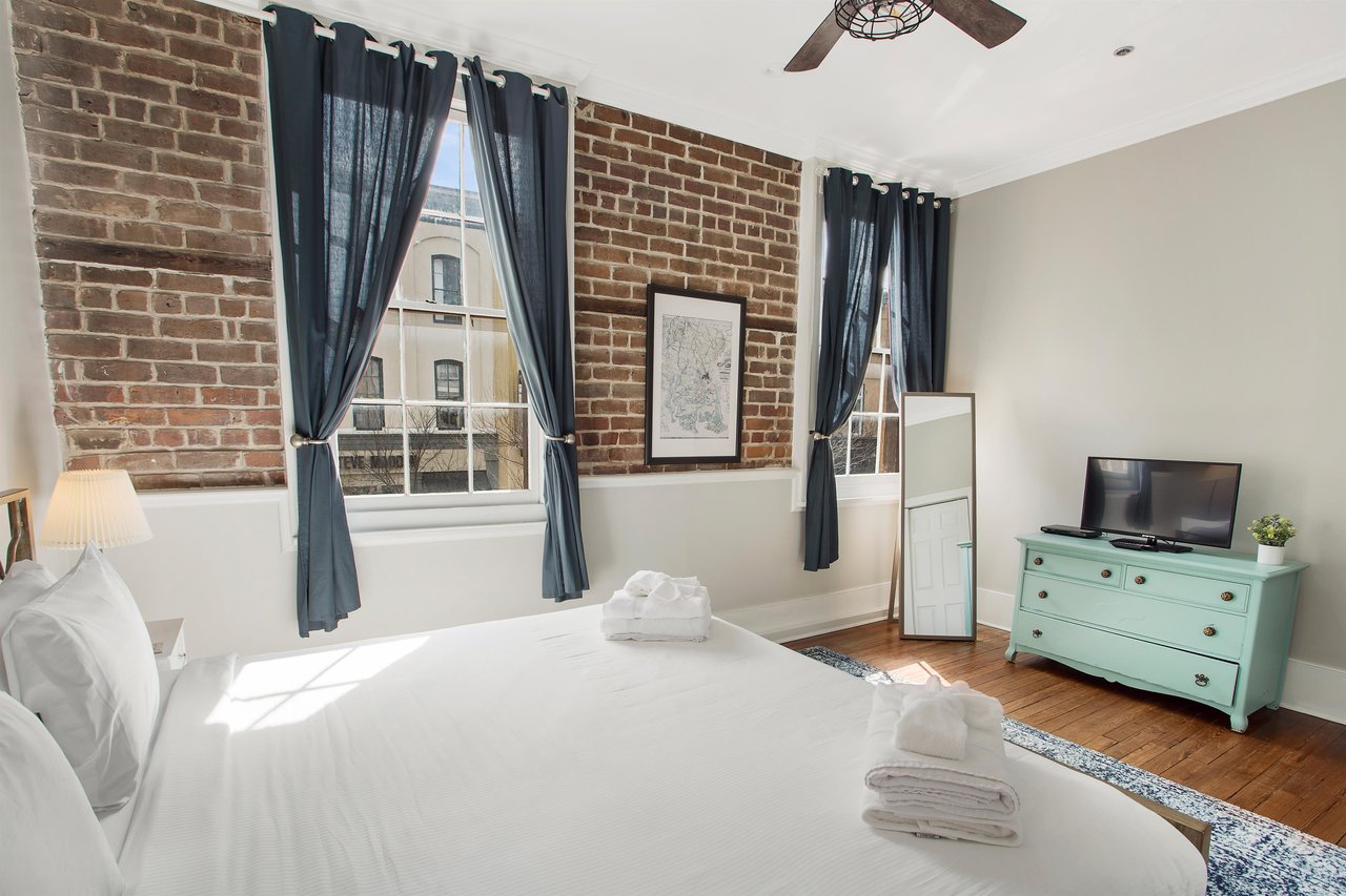 The exposed brick adds so much character to this space