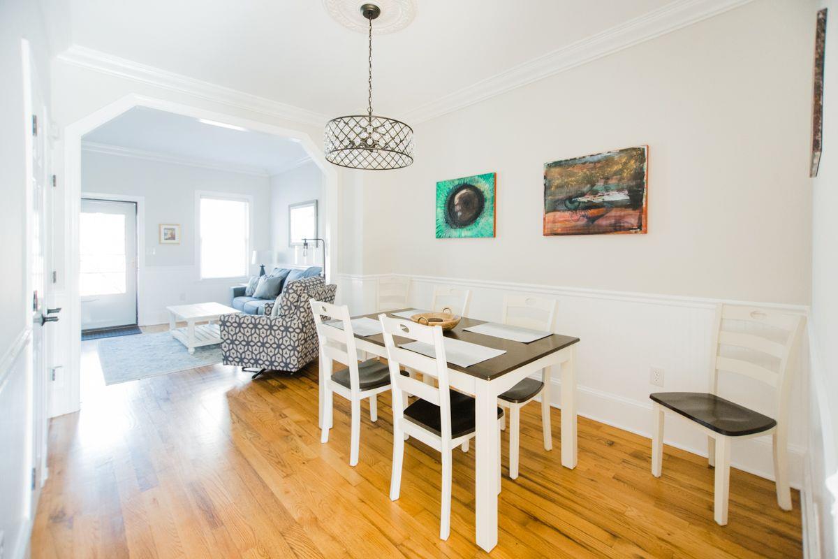 Step over to the dining space, open to the living room