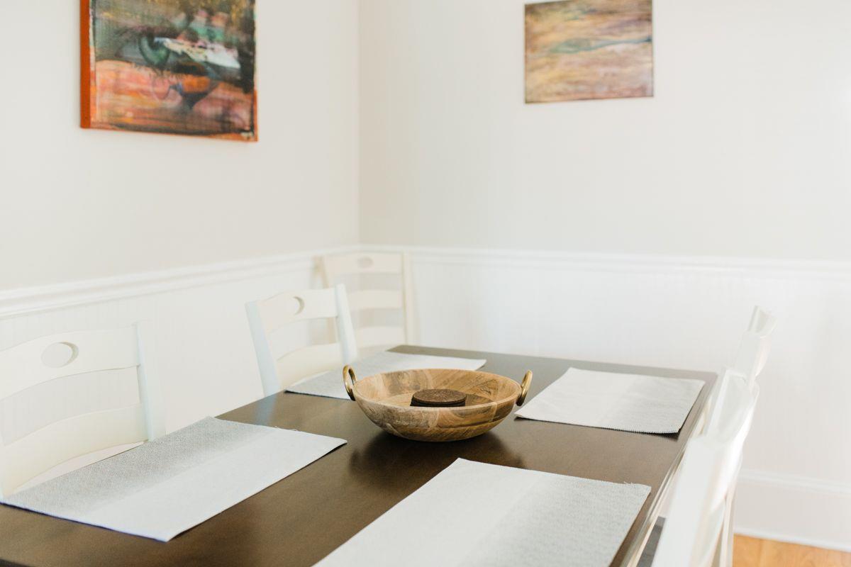 The dining space can also be served as a dedicated work space for those in town for business.