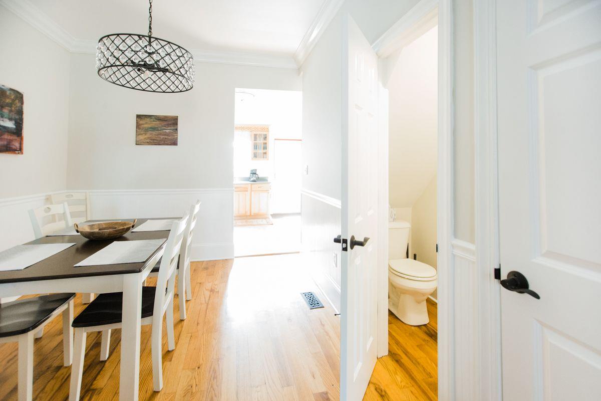 Just off of the dining room, a powder room.