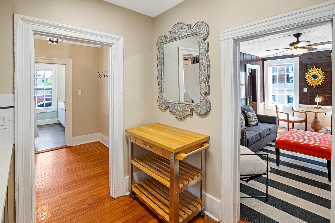 The moveable island is great for food storage, or to be utilized as a bar cart