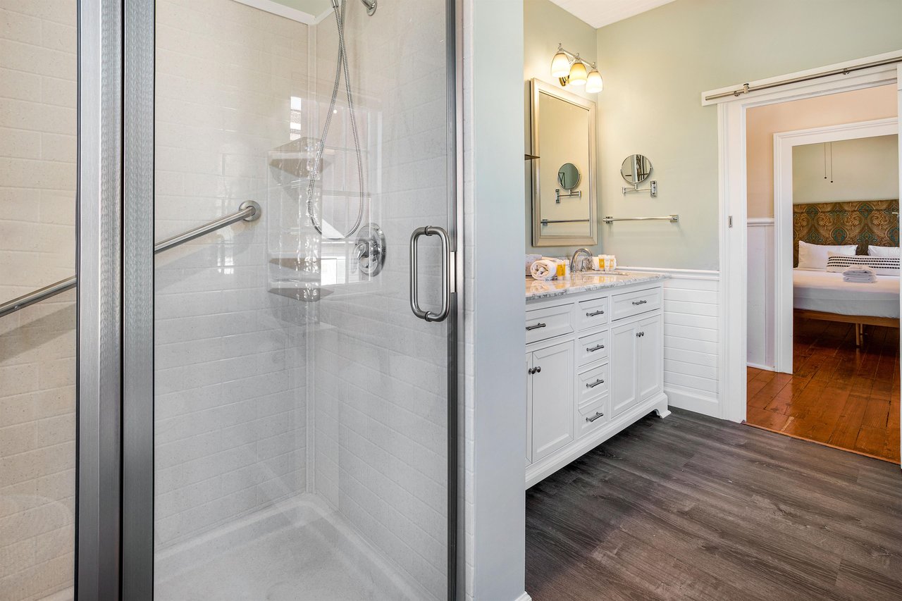 The large walkin shower is a great place to unwind after a long day.