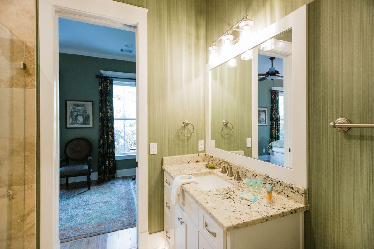 Beneath the vanity, the floor illuminates with motion lights.