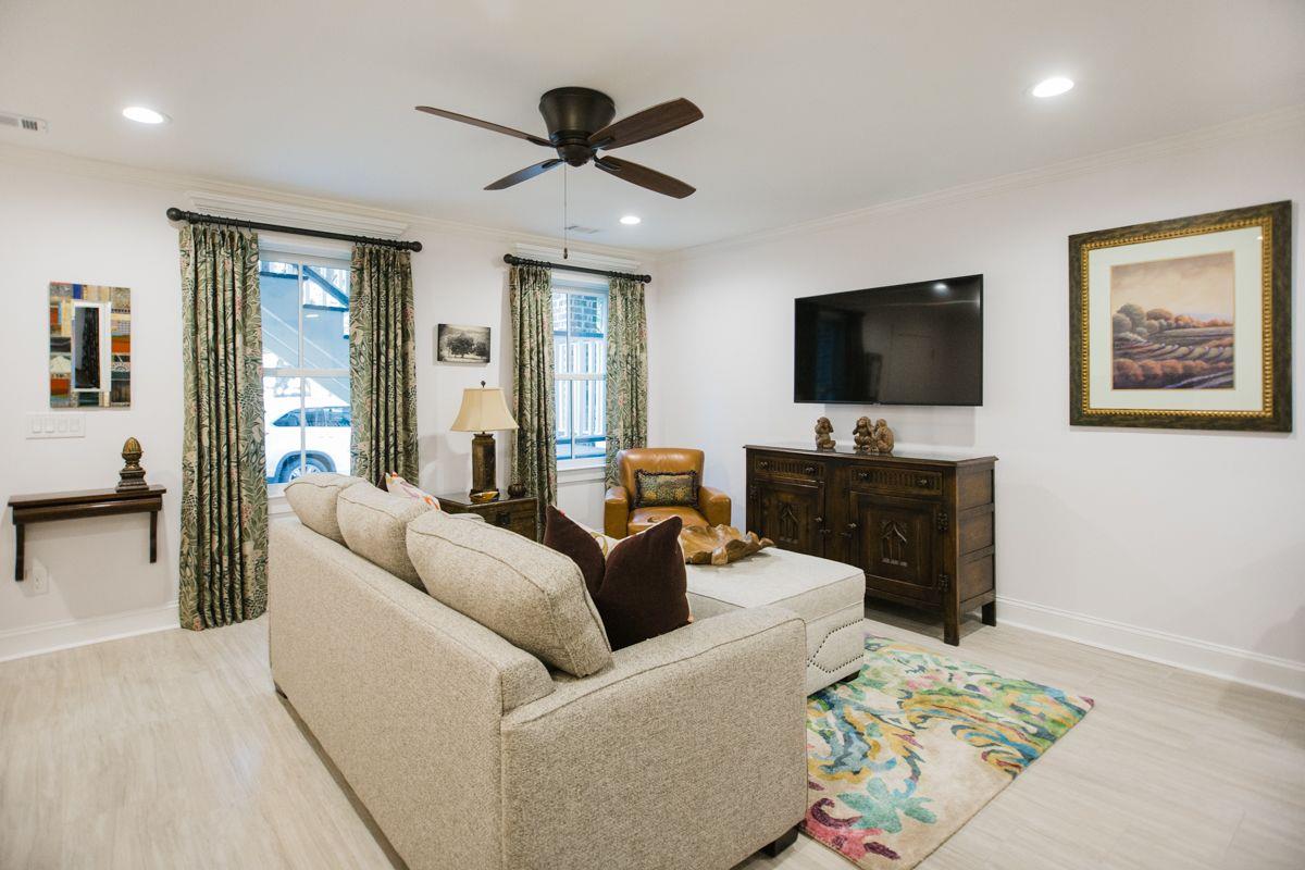 The sofa converts into a queensize sleeper, while the ottoman converts into a twinsize sleeper.