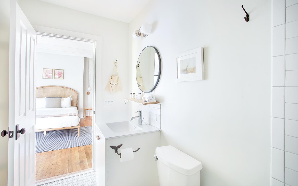 The full bath is opposite the bedroom.