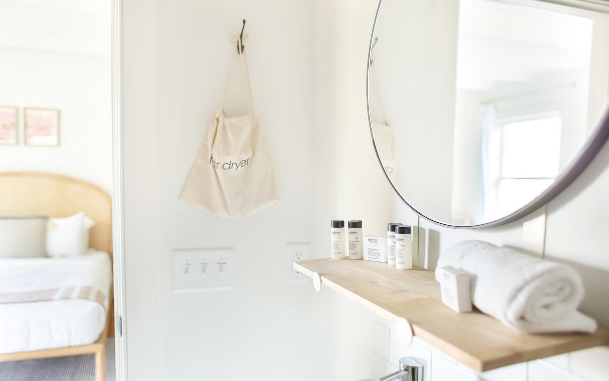Towels, soap, and a hair dryer are provided.