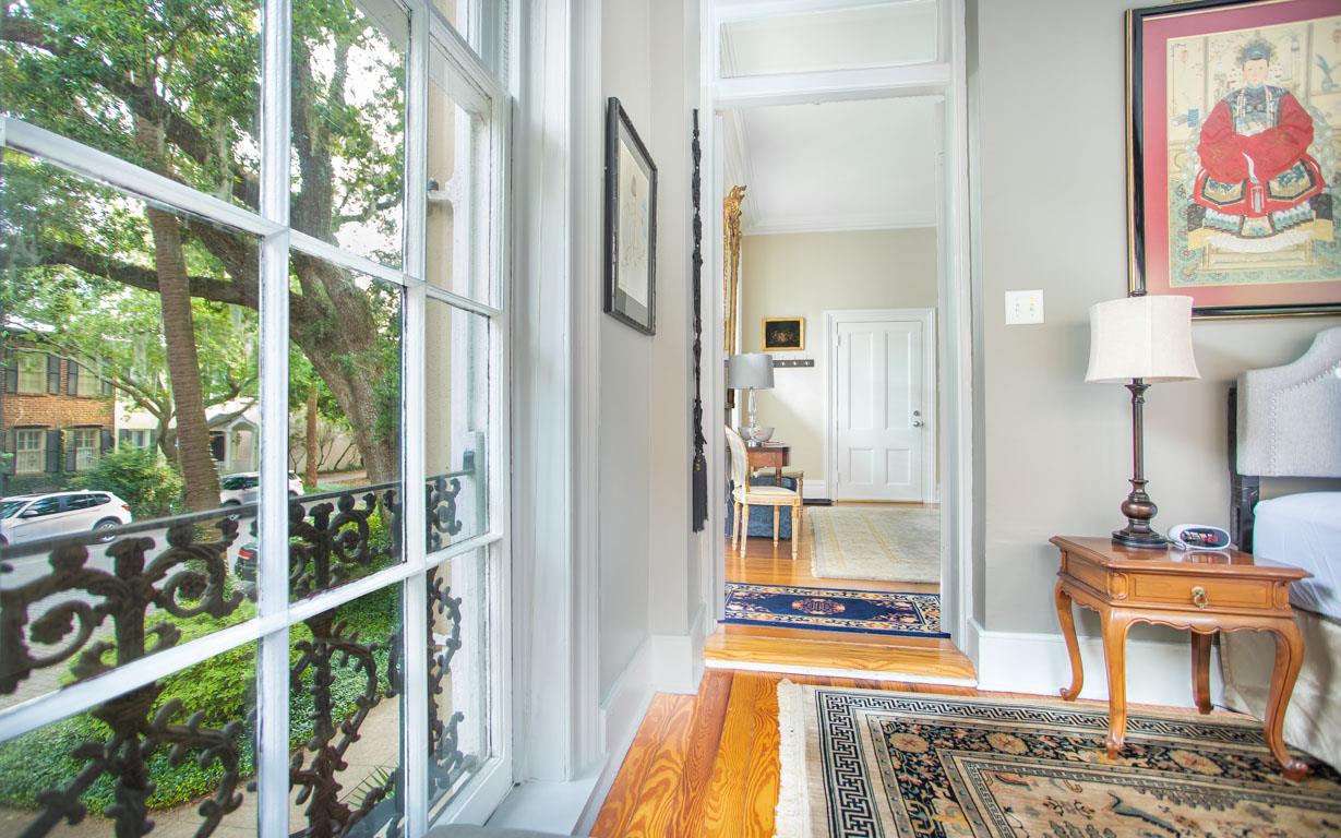 Across the hall, a lightfilled guest bedroom.