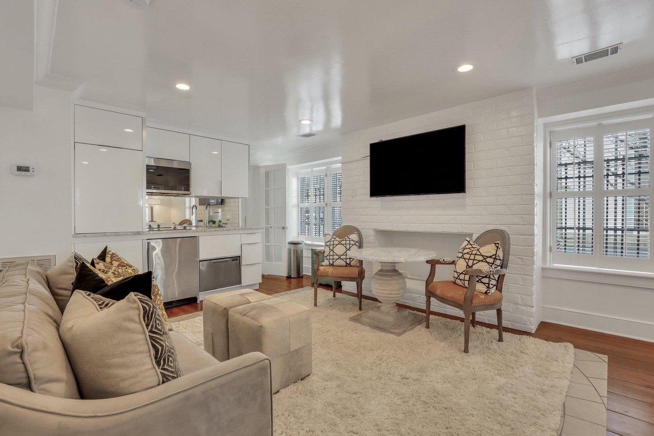 The garden level studio apartment features beautiful finishes and furnishings.