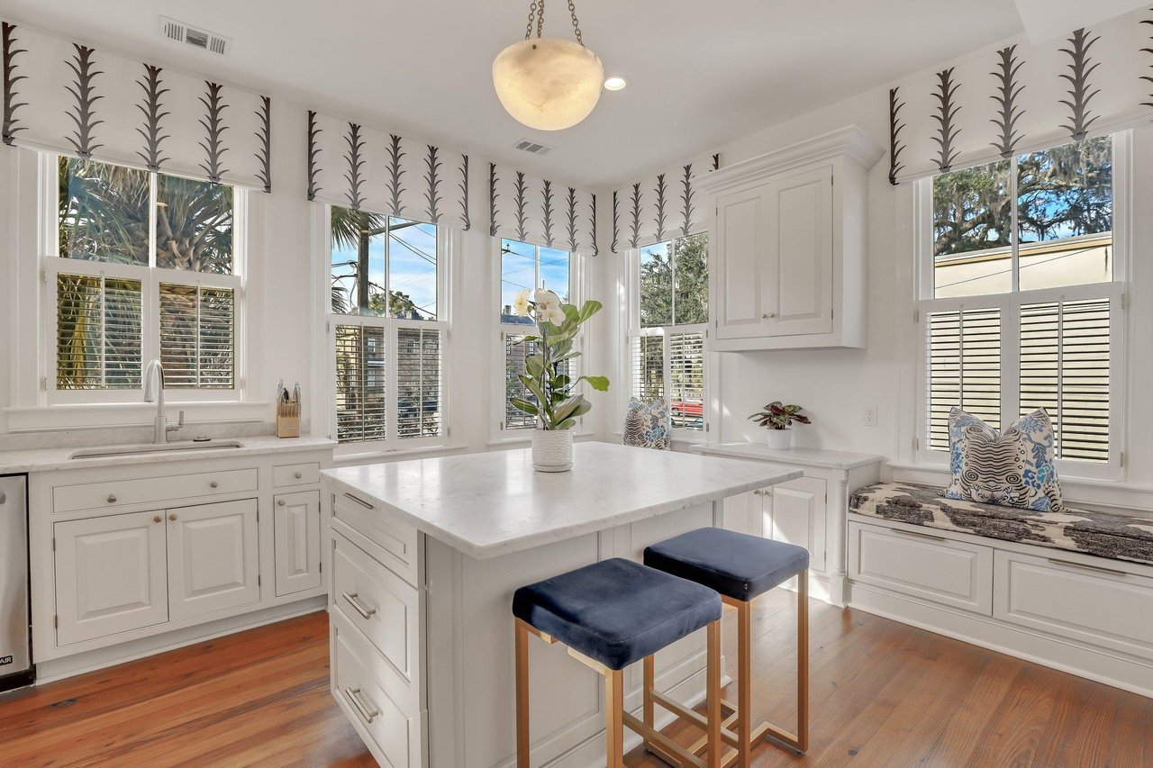 Heading into the kitchen, guests will find another room filled with windows and natural light.