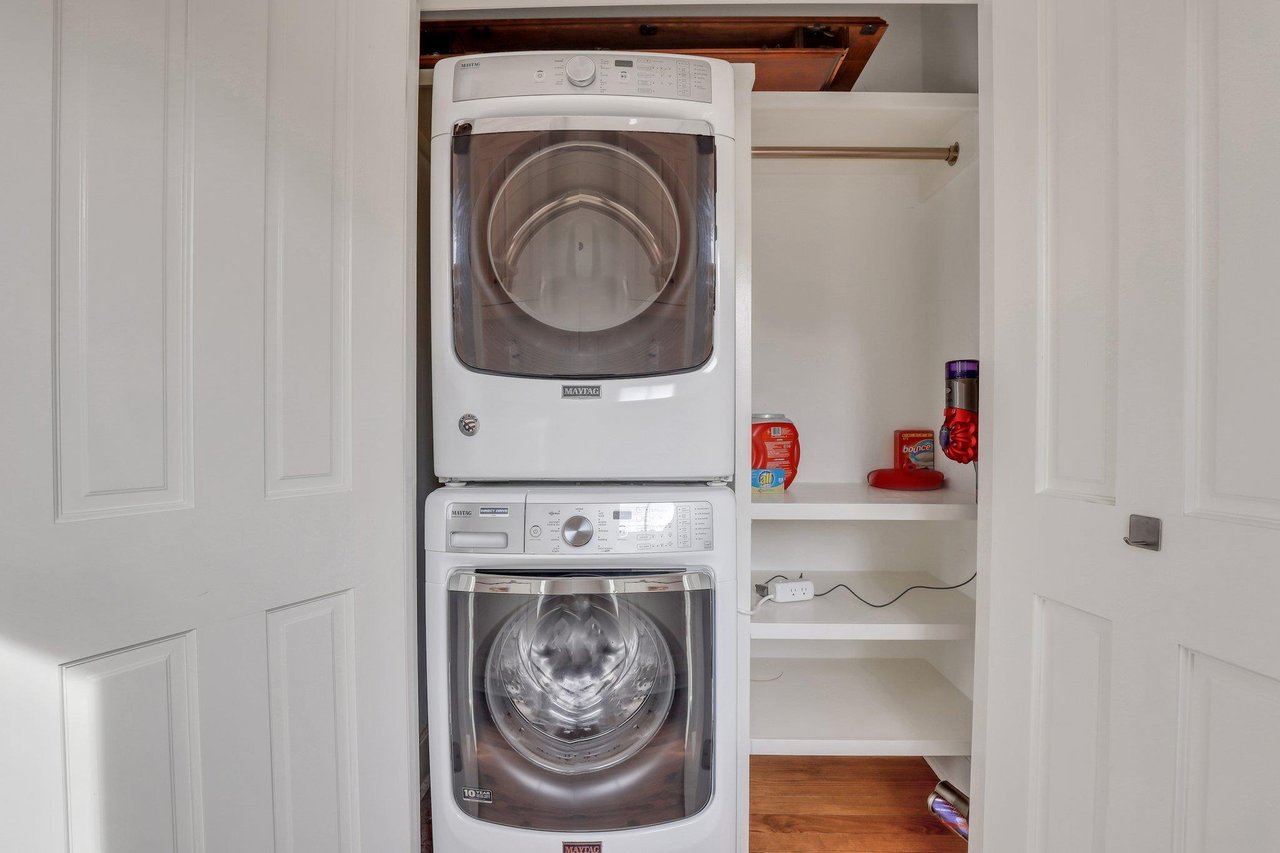 Just off of the kitchen, the laundry room is conveniently tucked away.