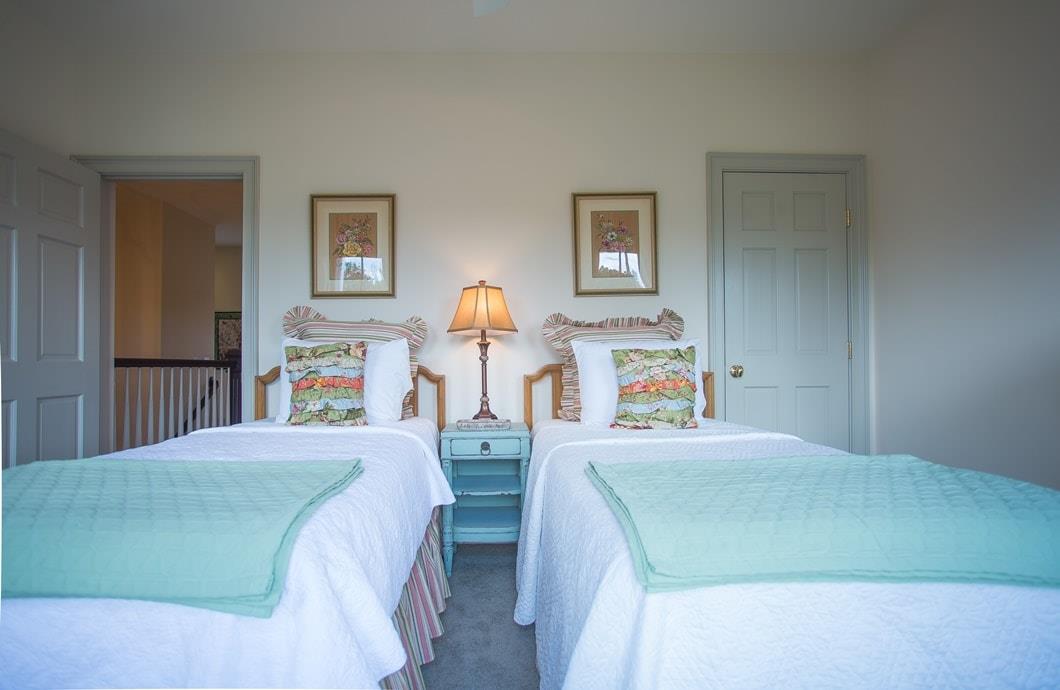 Cute double twin bedroom to gossip the night away with friends.