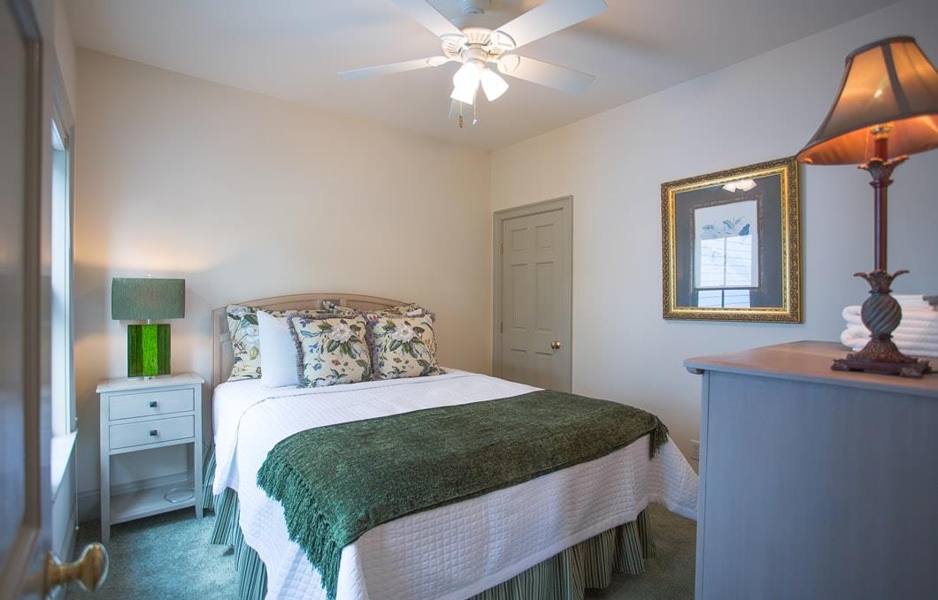 Second queen size bedroom on the top floor.