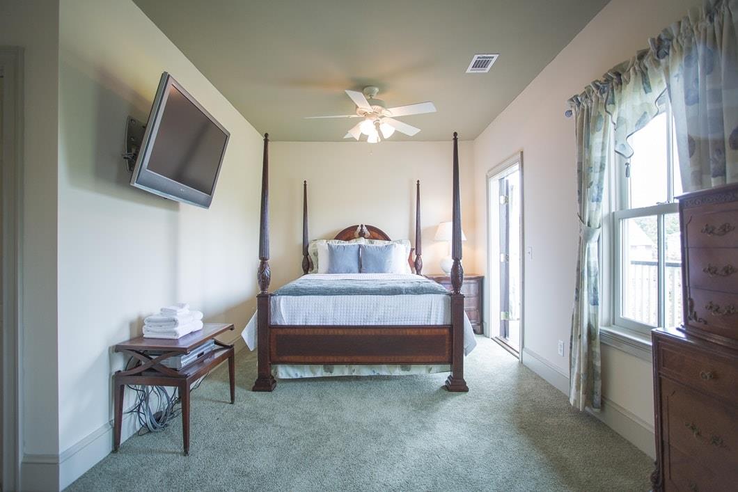 Queen size decorative four poster bed.