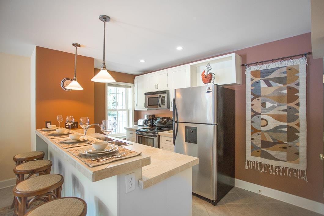 Full kitchen on the garden level is perfectly convenient for groups.