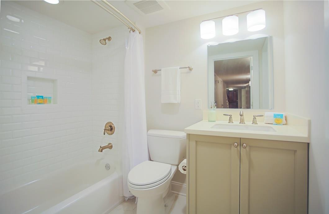 Take a soothing bath in this full tub and shower.