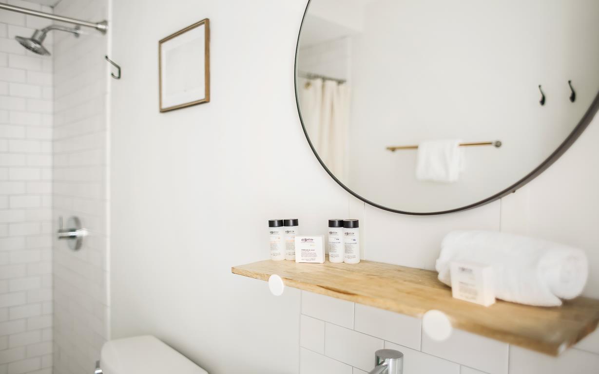 Towels, soap, and a hair dryer are provided.