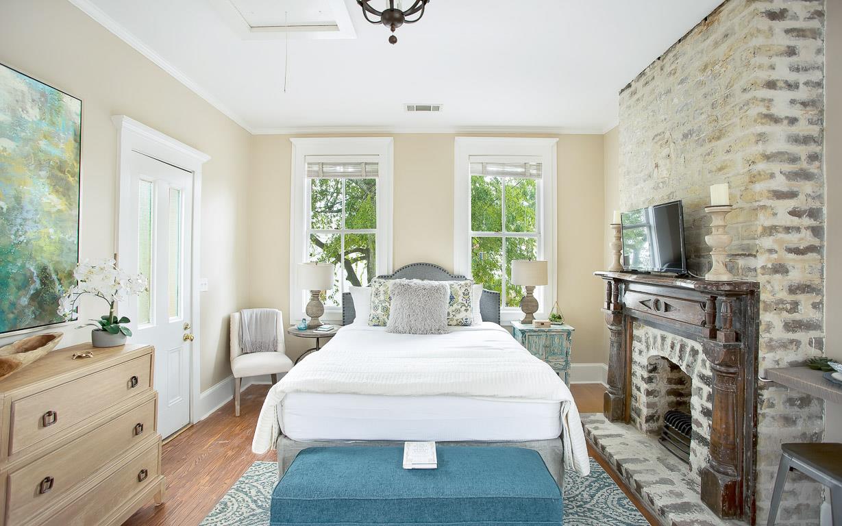 The fireplace now decorative anchors the room.