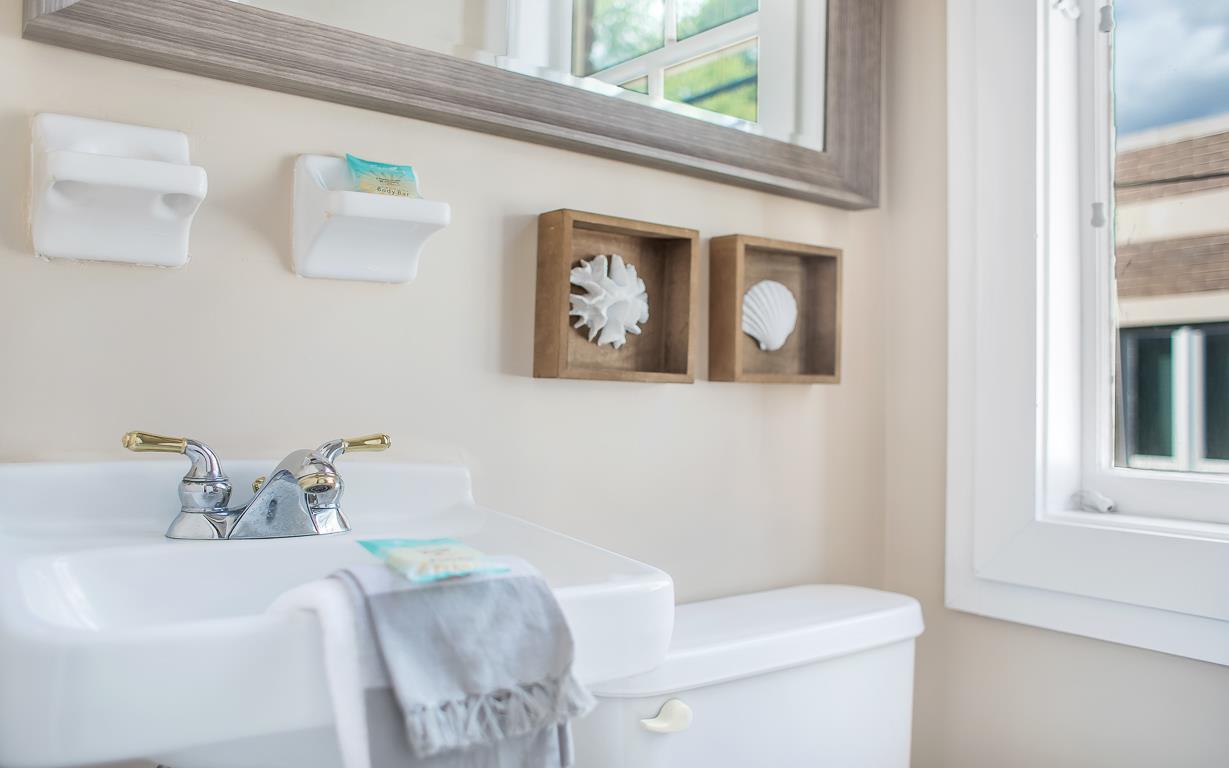 Towels, soap, and a hair dryer are provided.