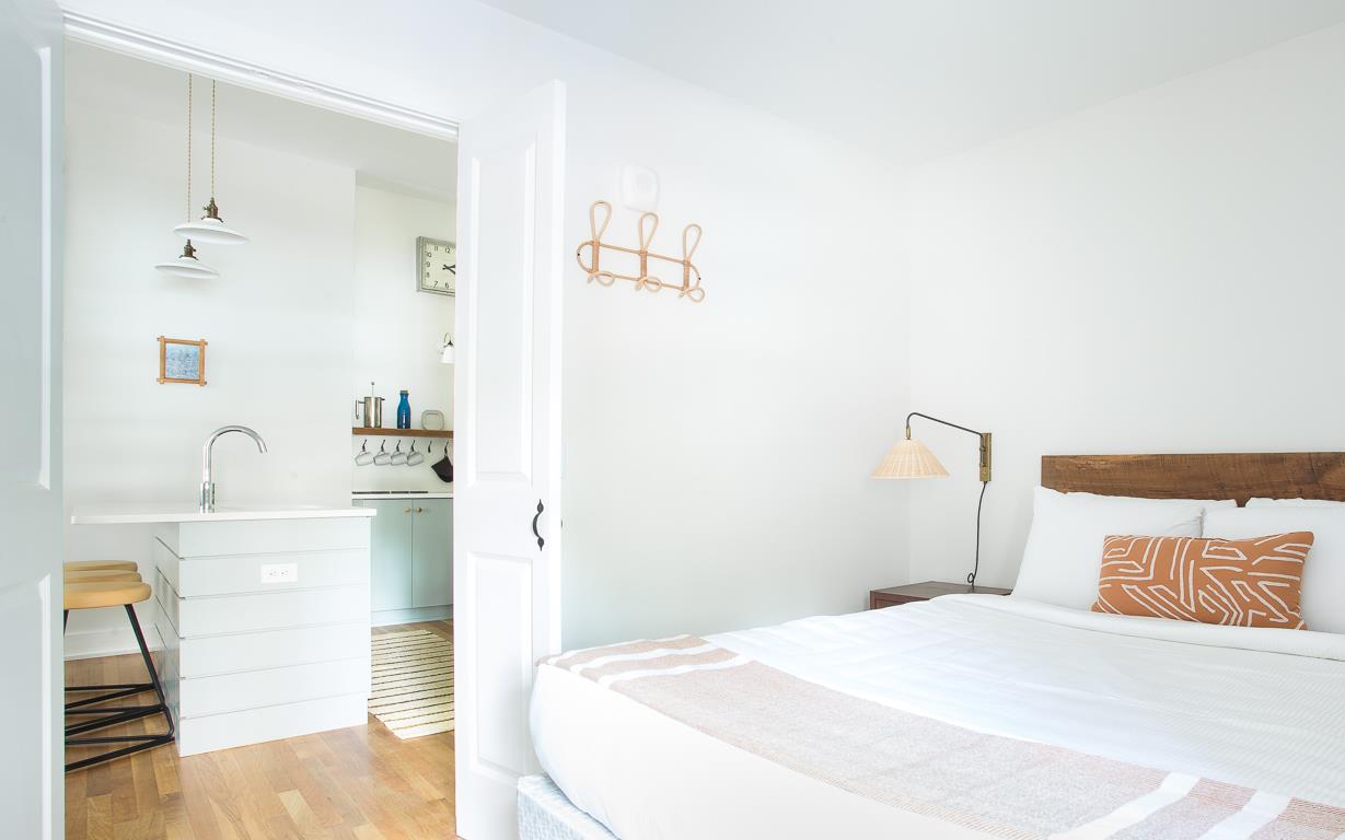 The first bedroom is just off the kitchen.