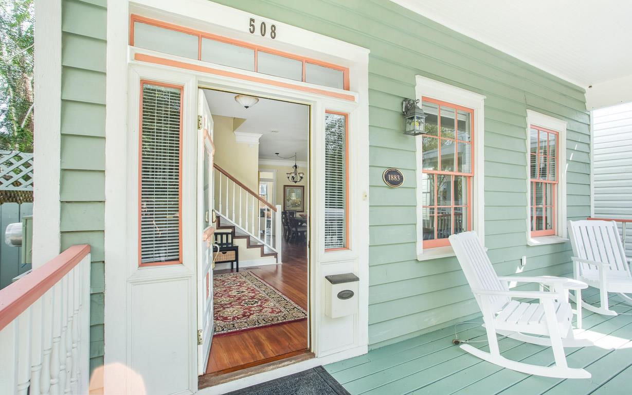 Step into your charming clapboard house.
