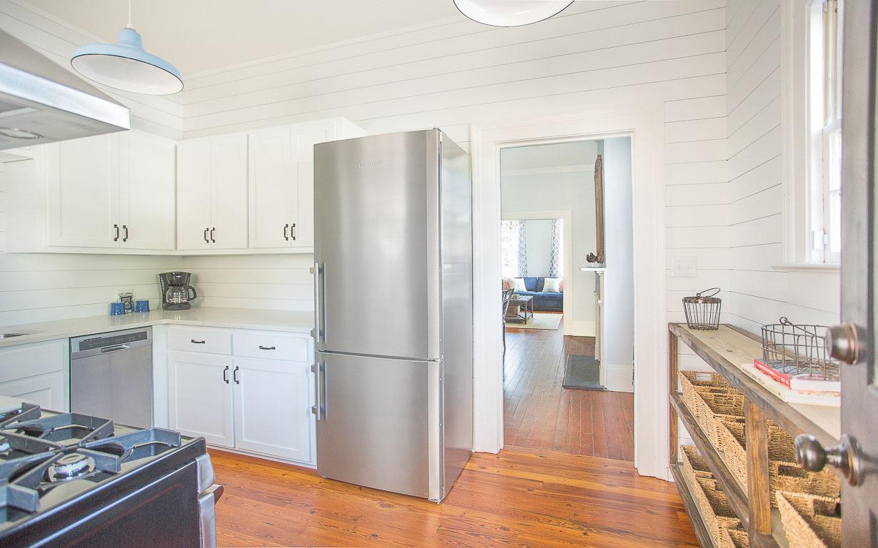 The kitchen is towards the back of the house.