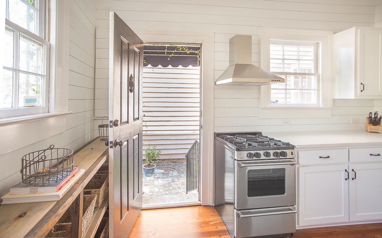 A private courtyard with grill is through the back.