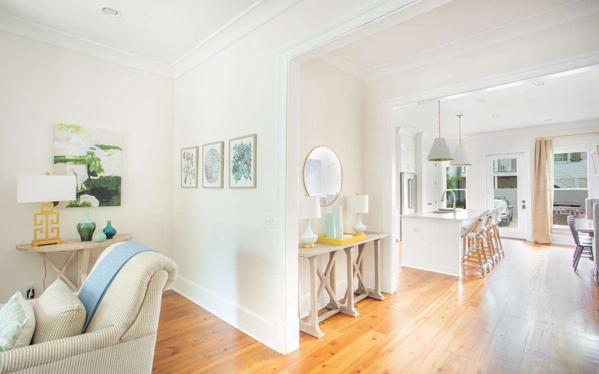 The living room leads to the kitchen.