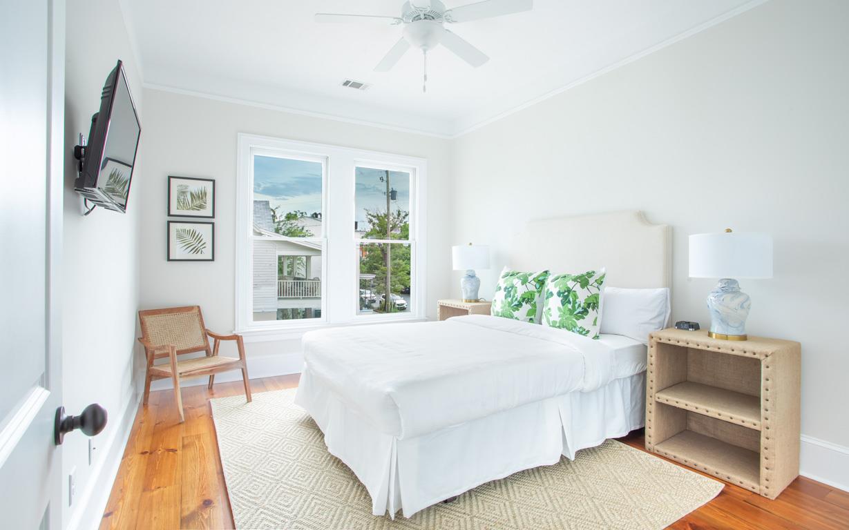 Upstairs, the first guest room has a Queen.