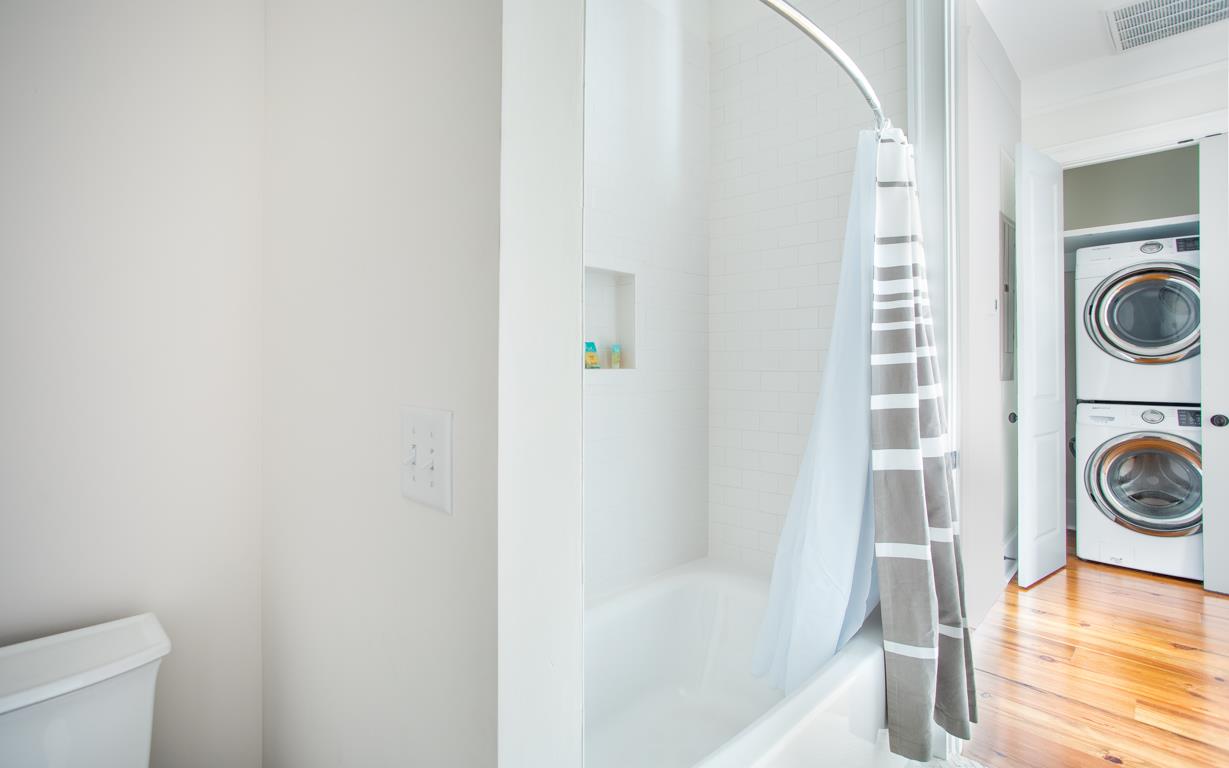 The guest bath has a tubshower combo.