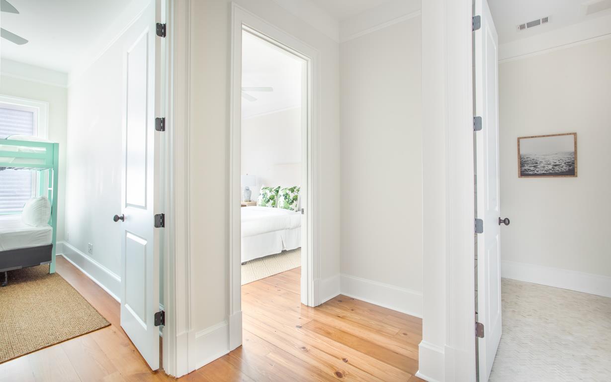 View of both guest rooms in relation to the full bath.