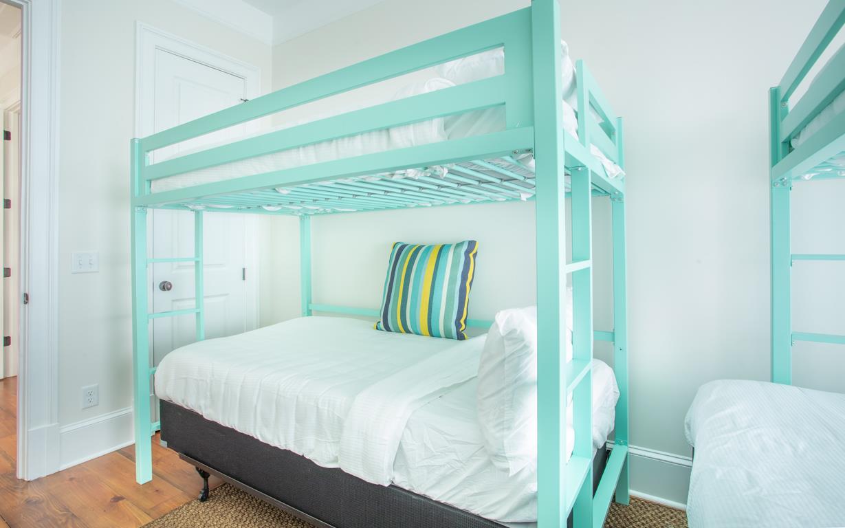 The second bunk has a Double mattress below.