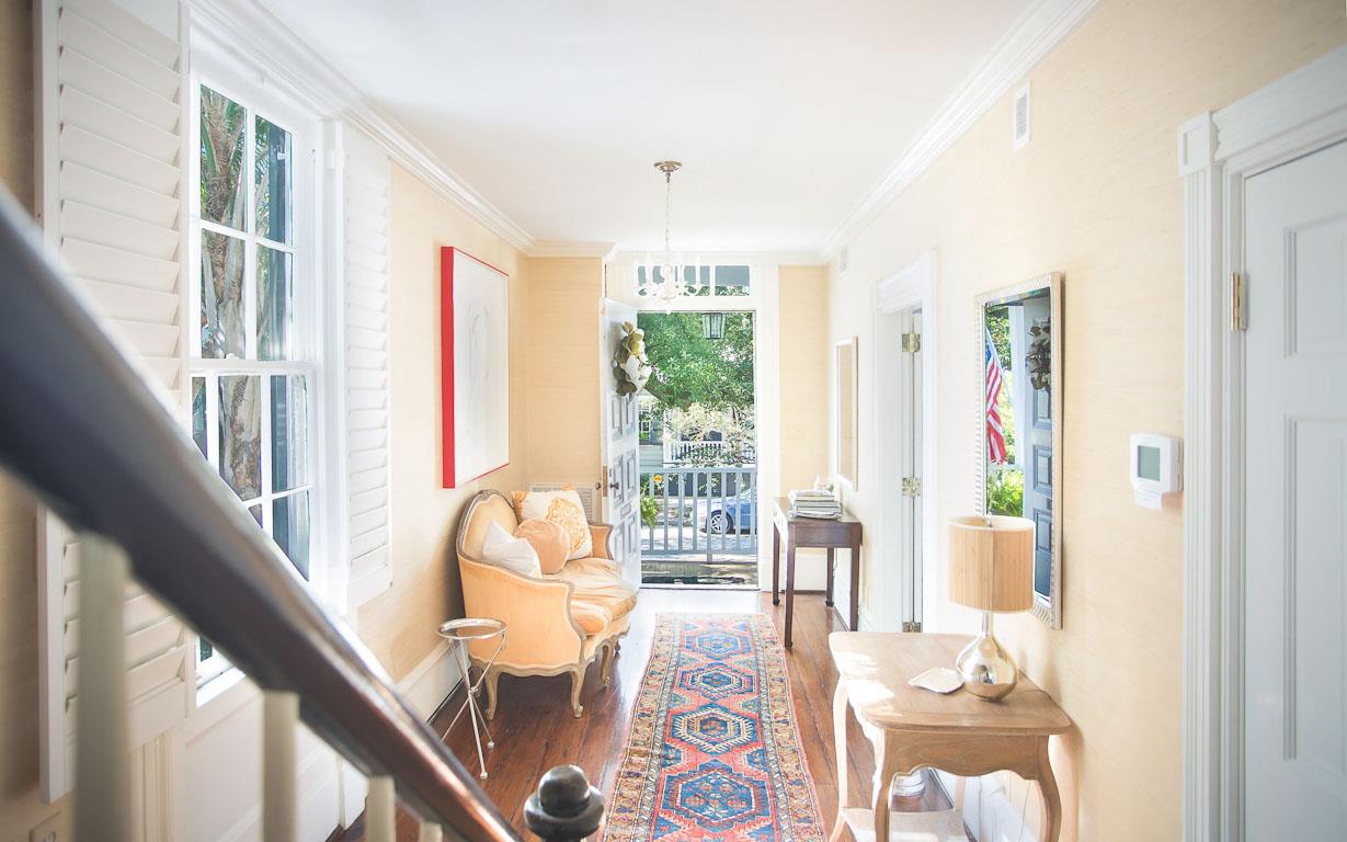 The entryway, featuring the homes original gorgeous floors.