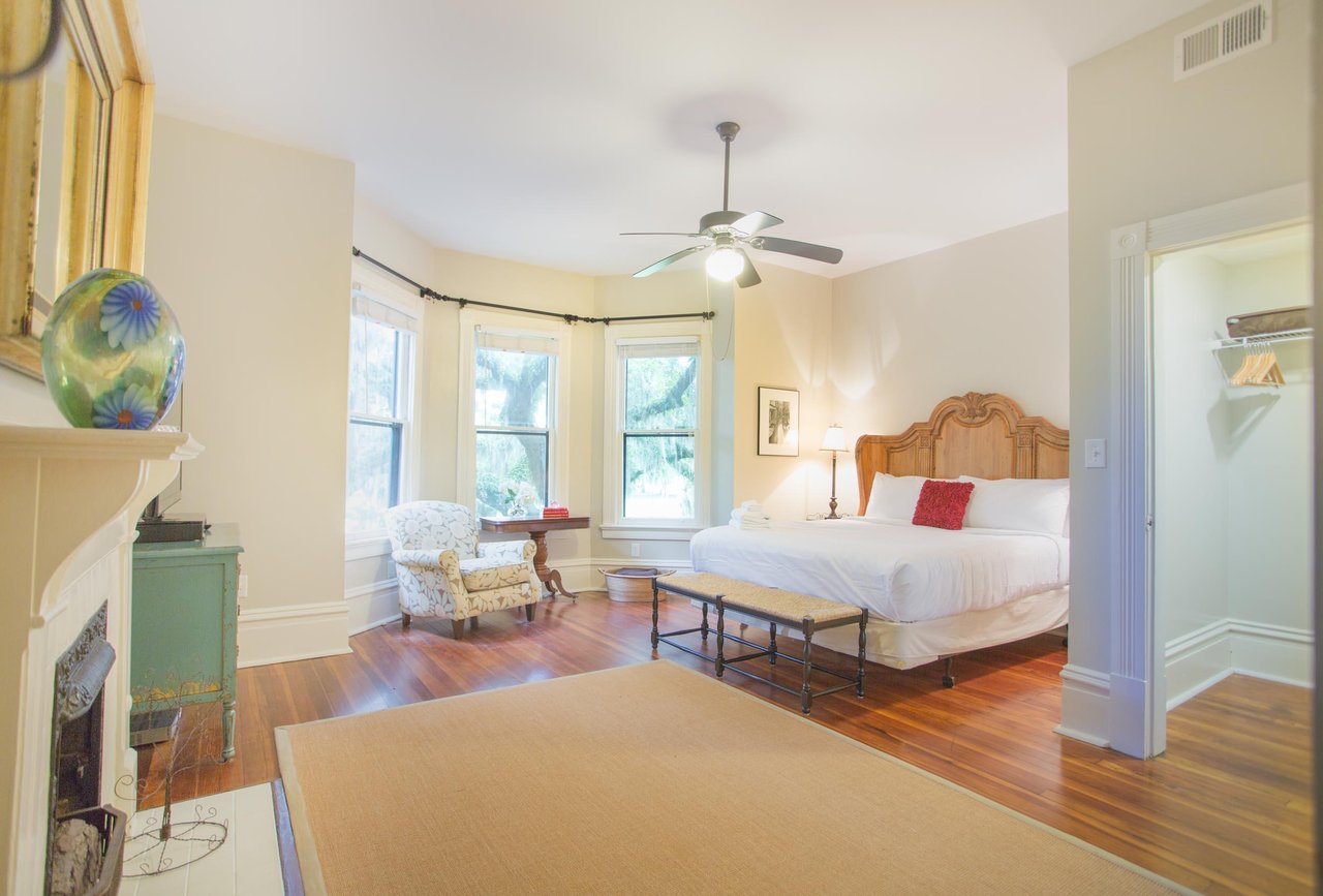 The bedroom has a ton of floor space.