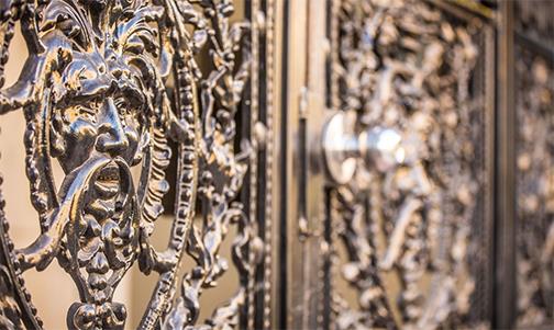 Decorative wrought iron works of the front gate.