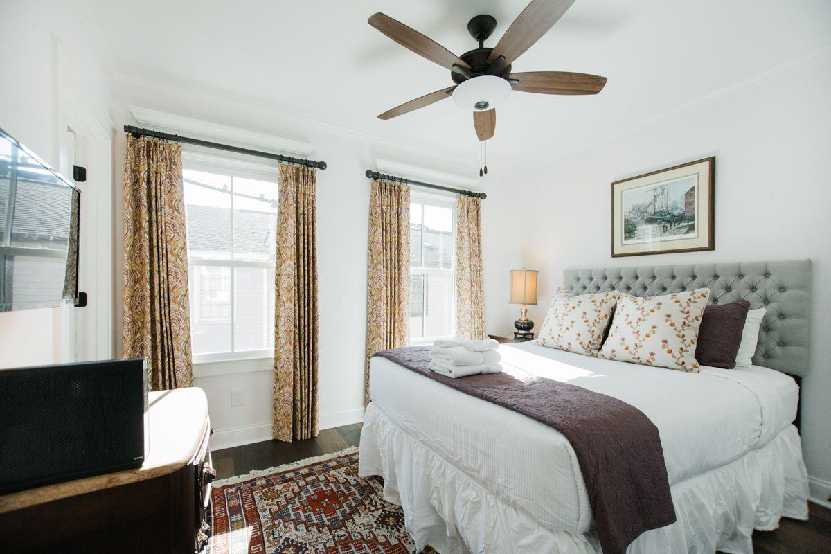 The bedroom sits just at the back of the carriage house.