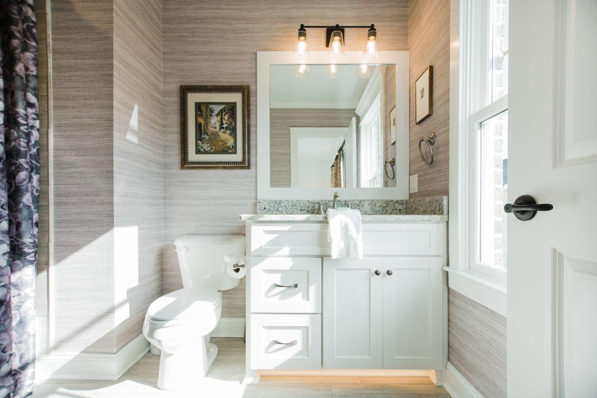 The cabinet is lit beneath, activated by motion.