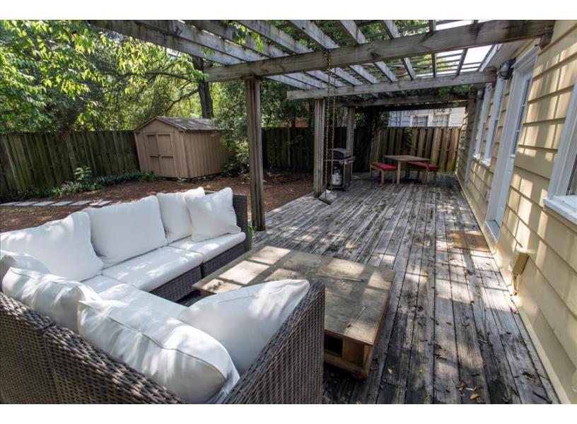 Back Deck with sitting area, grill and table.