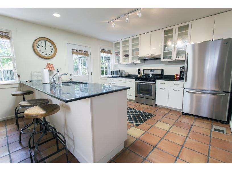 Fully equipped kitchen with modern conveniences.