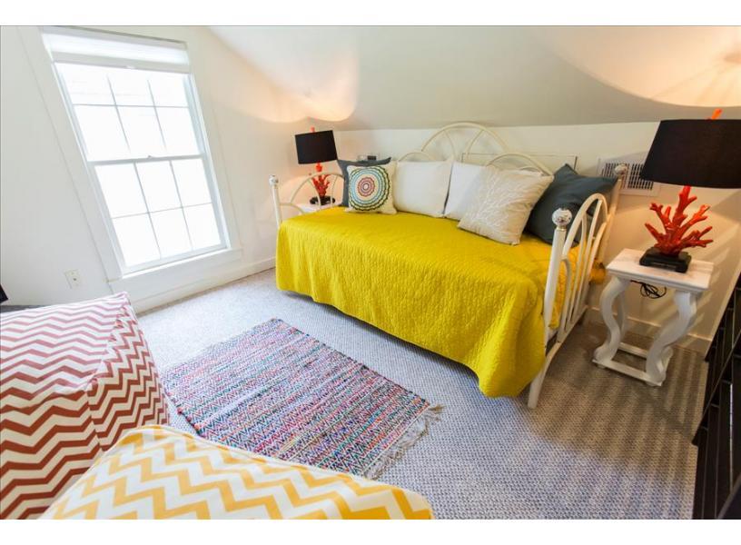 Daybed on second floor with trundle underneath.